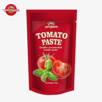 Tomatenpaste mit 100% Reinheit ist in einem 100g Stand-up-Paket verpackt